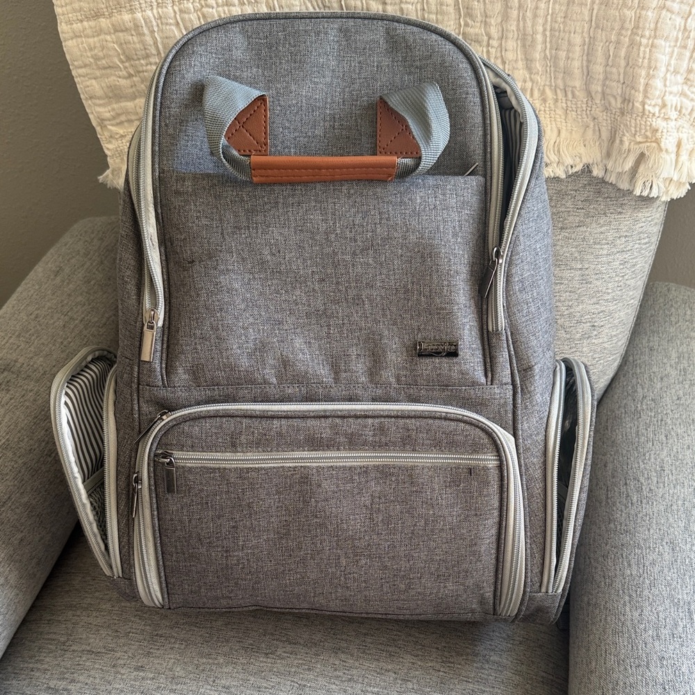 Gray Backpack with Brown Accents Pumping bag